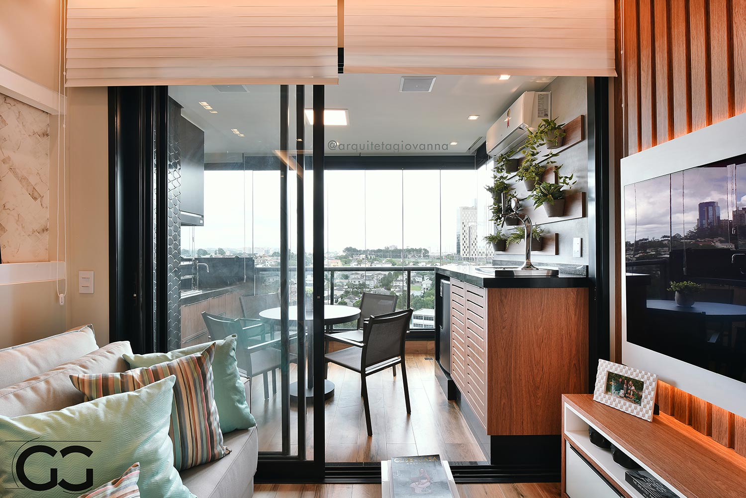 Sala com vista para sacada com cozinha gourmet