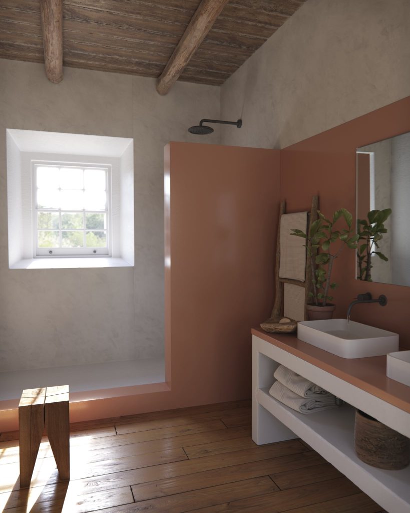 Banheiro rústico com piso de madeira, area de box cimentada, paredes em tom rose, superfície da bancada Silestone® Arcilla Red.