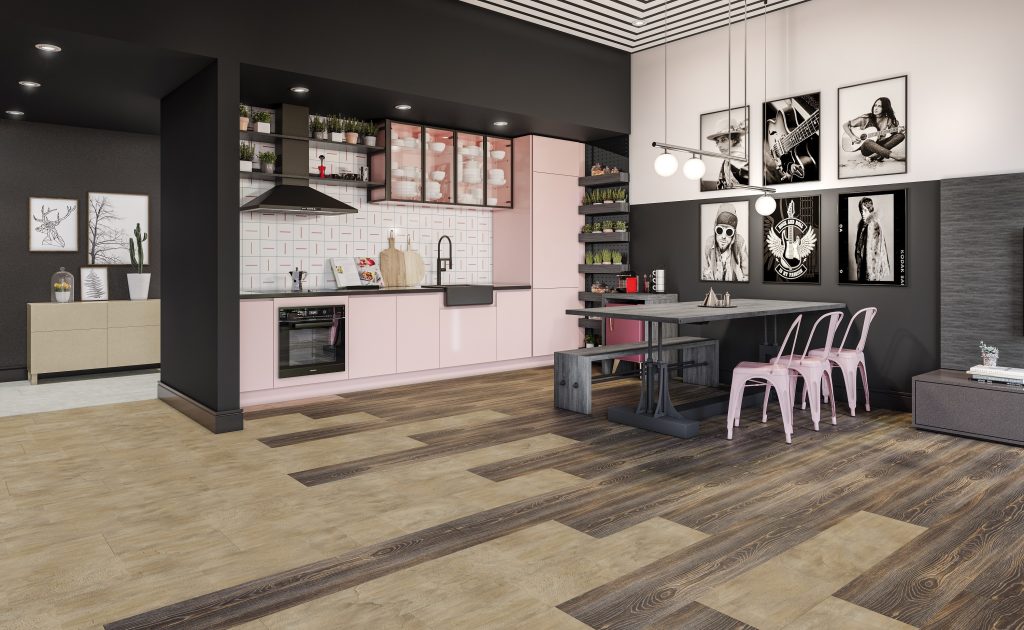 Cozinha com piso laminado marrom, paredes em preto e rosa, mesa preta com banco preto e cadeiras rosas, armários da cozinha rosa, parede da pia com revestimento branco.